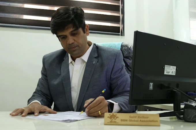 Salil Kelkar signing client documents